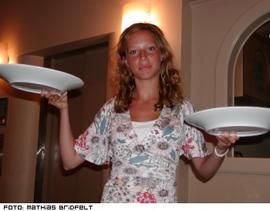 Caroline making pizzas